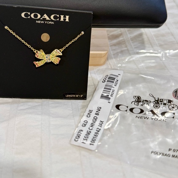 Coach Gold and Pink Bow Necklace